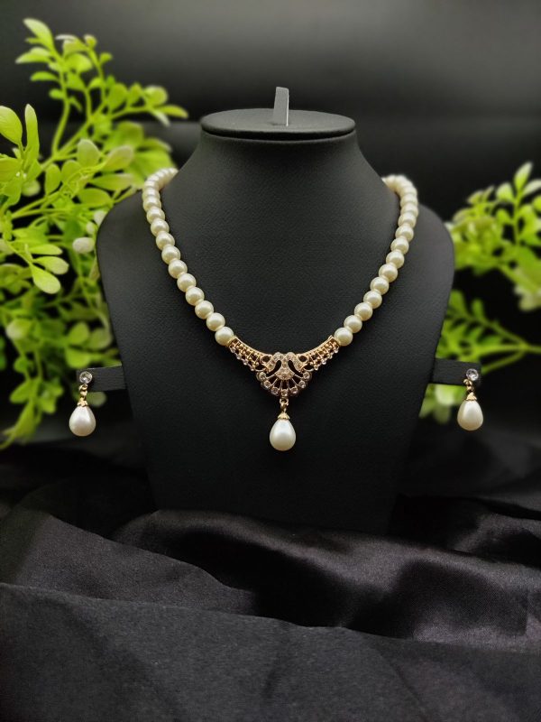 Imported Regal Pearl Embrace Necklace Set With Elegant Drop Design